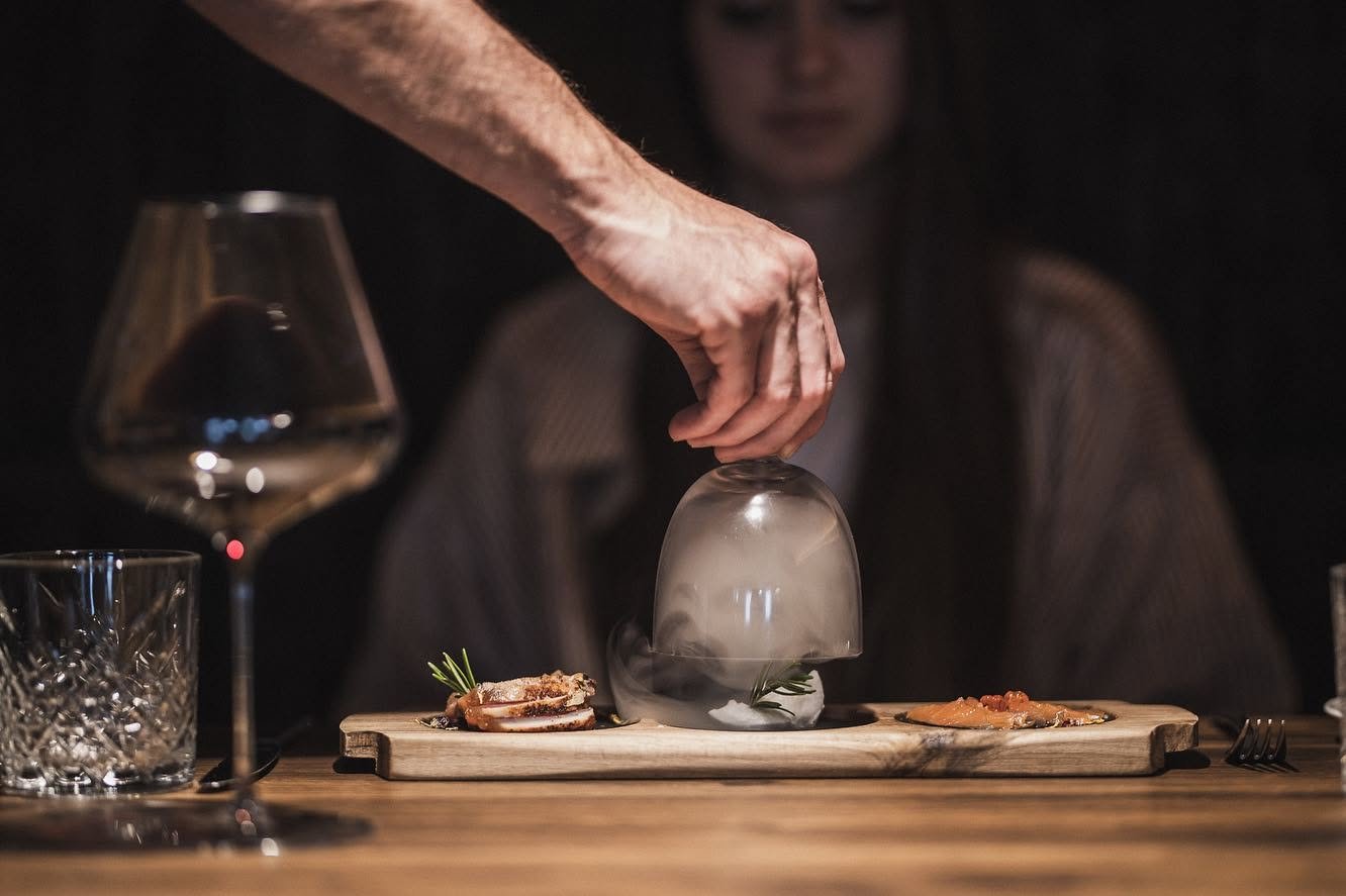 Atmosphere and dining at Moretto's Steakhouse
